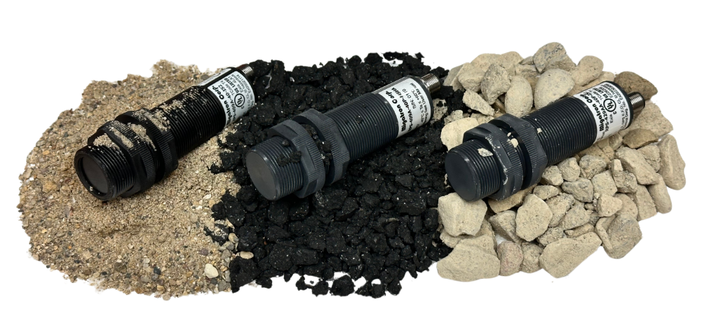 three industrial sensors on bulk materials